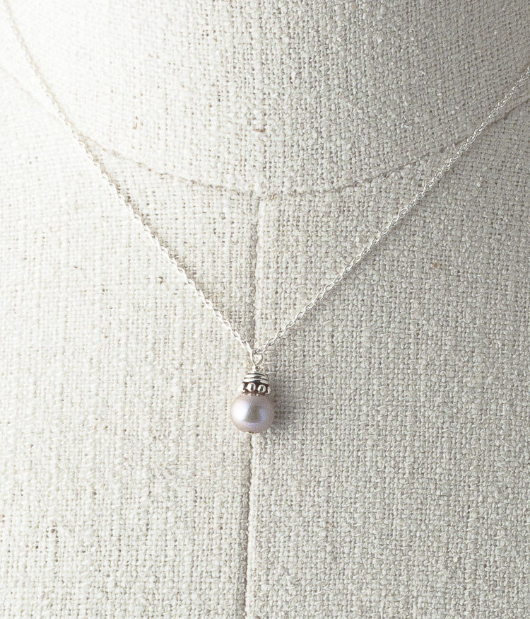 Freshwater pearl, Turkish sterling, sterling silver.
Necklace 16" or 18"