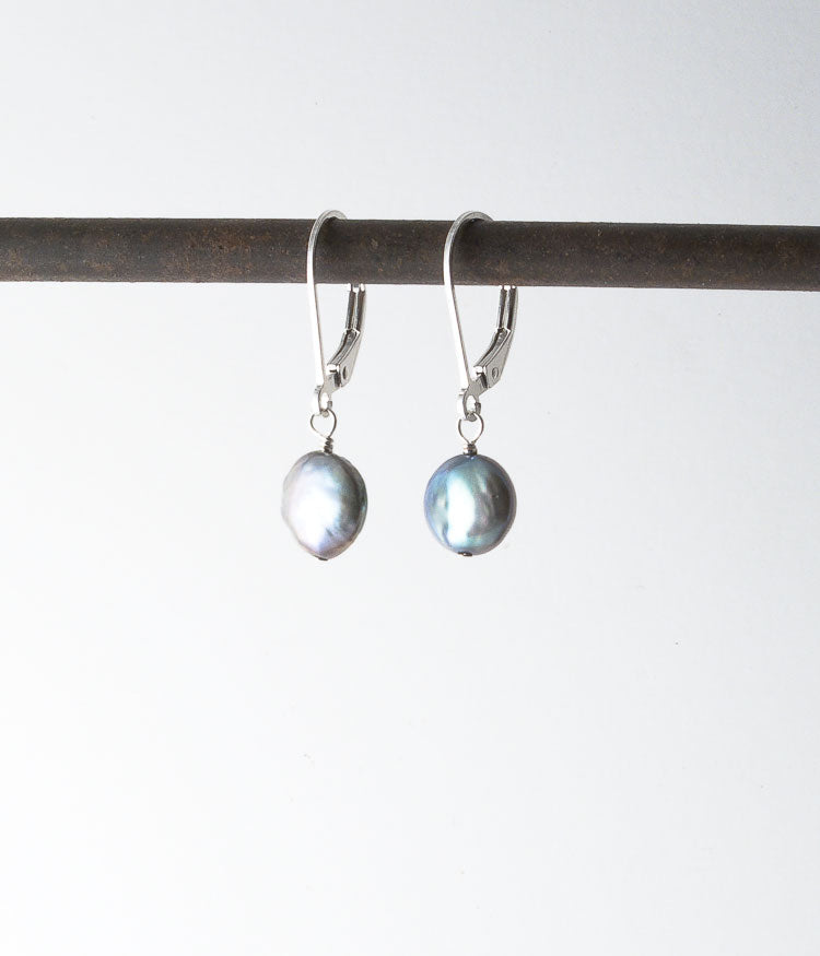 Freshwater pearl, sterling silver. 
Earrings, 1"