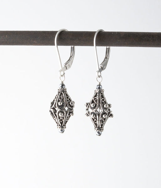 Balinese and sterling silver. 
Earrings, 1.25”