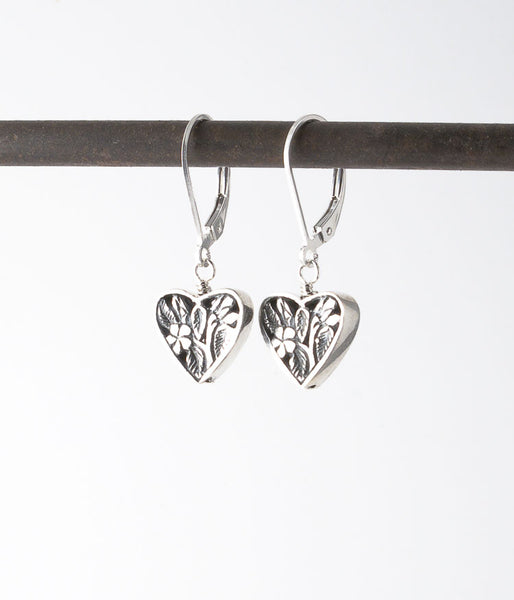 Balinese sterling silver. 
Earrings, 1.25"