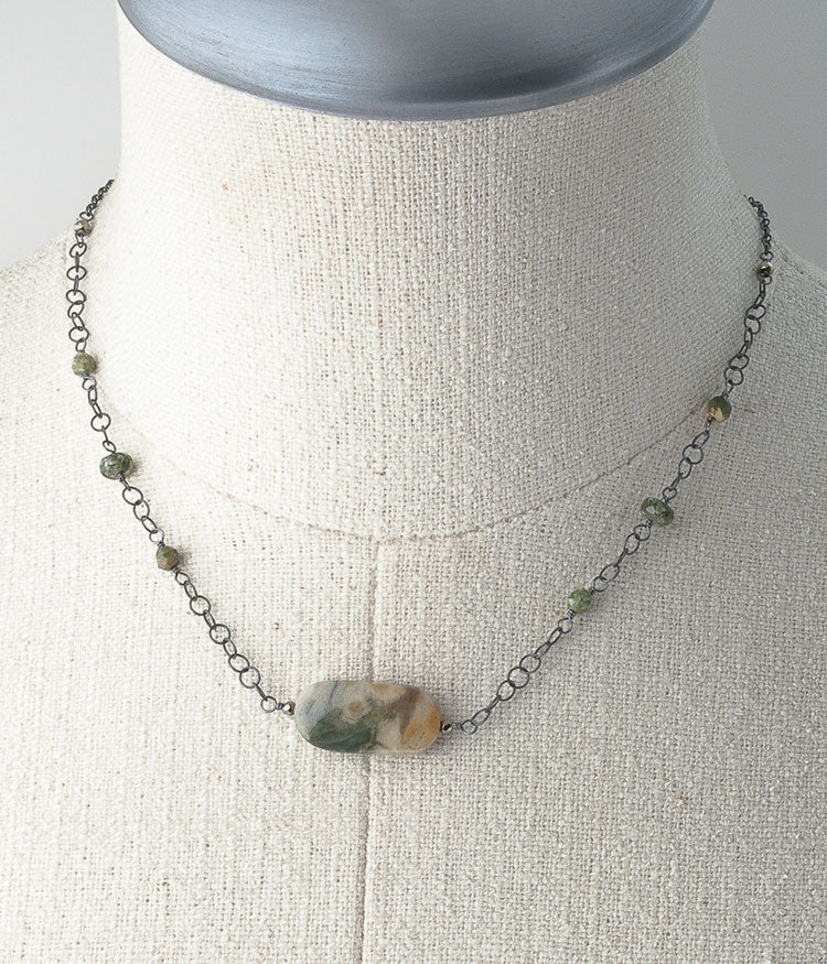 Petrified wood, rhyolite, oxidized sterling silver. 

  Necklace (adjustable), 17-19"