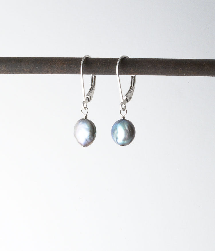 Freshwater pearl, sterling silver. 

Earrings, 1" 