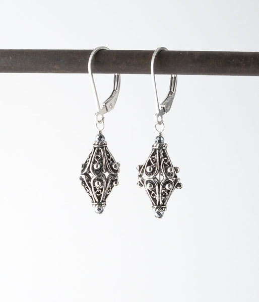 Balinese and sterling silver.   

Earrings, 1.25” 