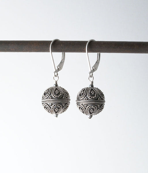 Balinese sterling, sterling silver. 

These beads show the high quality craftmanship that Bali is known for, with each individual bead and wire being placed on the core bead by hand. It is a form of meditation for the artists, skill being passed on from generation to generation. 

Earrings, 1.5" 