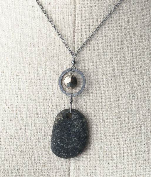 Lake Michigan Granite, pyrite, oxidized sterling silver.   

Necklace (adjustable), 18-20 with 2.25" drop